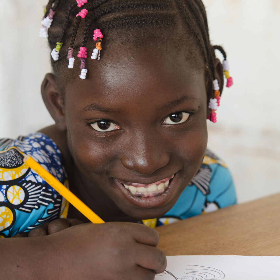 Happy child holding a book